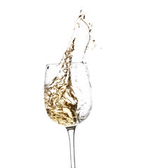 Glass with splashing wine on white background