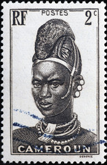 Woman portrait on vintage stamp of Cameroon