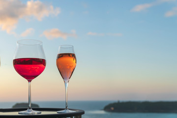 Different kind of cocktail glass, a glass of champagne, red wine and rose wine with sunset background, festive celebration. Christmas festive celebration. End of the year, Welcome start New Year 2019 