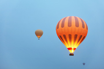 Hot Air Balloons With Fire Light Flying In Blue Sky, Travel 
