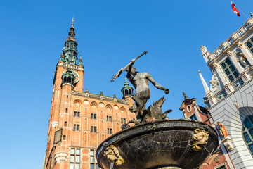 Fountain of the Neptune at sunny day. Old town of Gdansk, Poland © dziewul