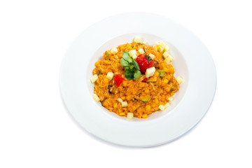 Risotto with white mushrooms and Parmesan cheese in a white plate