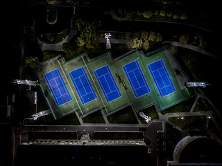 Tennis fields aerial city view