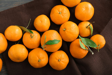 Tasty tangerines on napkin