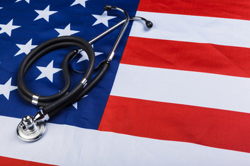 Close-up Photo Of Stethoscope On American USA Flag
