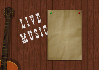 Musical background live music with wooden boards, acoustic guitar and a piece of paper for an inscription or image.