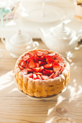 Sweet cake Strawberry charlotte close-up on the table