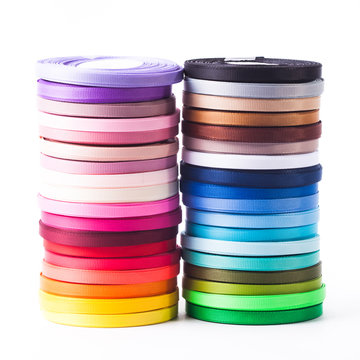 The ribbons bobbins isolated on the white