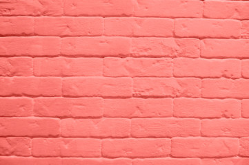 Close up of modern coral brick tiles wall texture background.