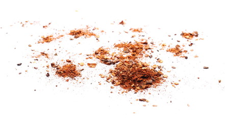 Crushed, ground red cayenne pepper, spicy chopped paprika isolated on white background