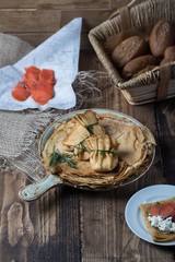 Crepes pancakes with smoked salmon and herbs countryhouse style