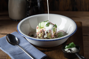 Okroshka with kvass or kefir. Traditional meal of the Russian cuisine. Prepared by chef