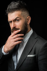 Meeting suit. Businessman in dark grey suit. Man in classic suit, shirt and tie.