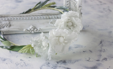 White wedding background with silk hair flowers