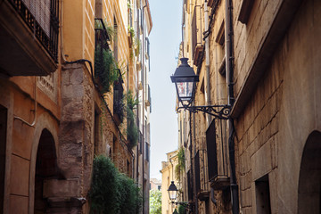Fototapeta na wymiar Narrow street in the old city of Girona, Spain