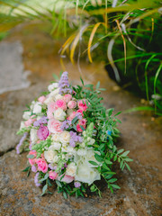 Wedding bouquet made of white and pink flowers. Beautiful bridal floristic.
