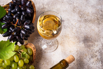 Grape, bottle and glass of white wine 