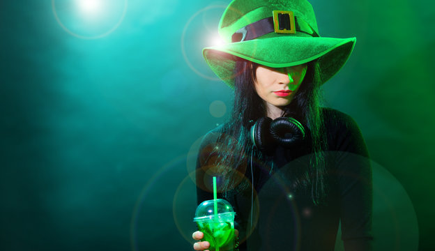 Portrait dj headphone st Patrick green hat cocktail drink equipment disco girl party desk mixer glamour disc young woman girl