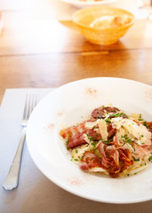 Crispy fried bacon with potato hash brown and cheese