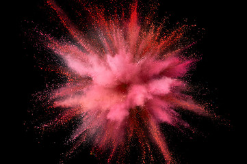 Colored powder explosion. Abstract closeup dust on backdrop. Colorful explode. Paint holi