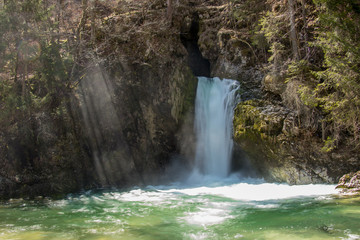 Fototapeta na wymiar waterfall and sunlight next to it