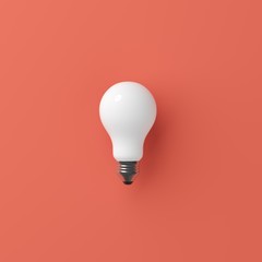 Minimal concept outstanding white light bulb on red background.