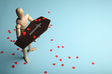 Red hearts on coffin, funeral. Loss of close and pain.