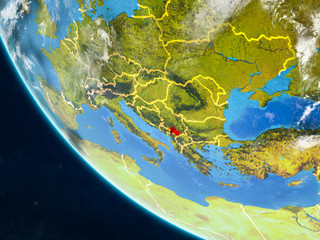 Kosovo on planet Earth from space with country borders. Very fine detail of planet surface and clouds.