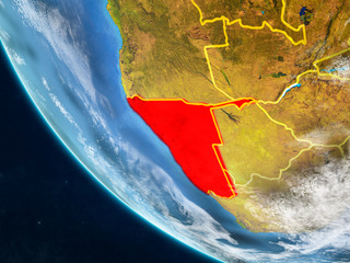 Namibia on planet Earth from space with country borders. Very fine detail of planet surface and clouds.