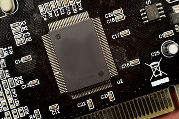 Close-up of electronic chip in desktop computer motherboard circuit.