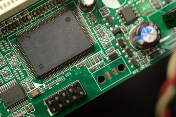 Close-up of electronic chip in desktop computer motherboard circuit.