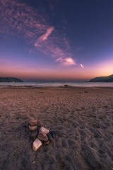 Fototapeta na wymiar Stones and sand in Elba