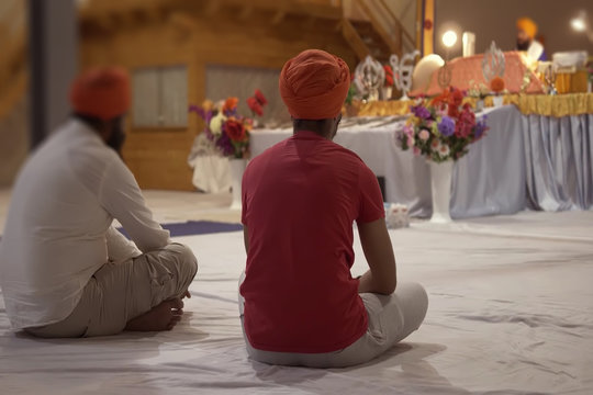 Abstract, blur, bokeh background, defocusing - image for the background. Two men in the temple