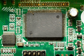 Close-up of electronic chip in desktop computer motherboard circuit.