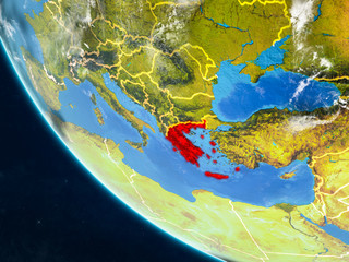 Greece on planet Earth from space with country borders. Very fine detail of planet surface and clouds.