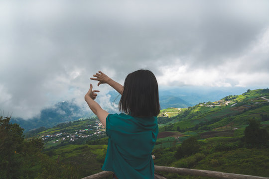 Happy young cute asian Japanese girl hipster backpack photography women taking a photo  at beautiful sky mountains scenery views 