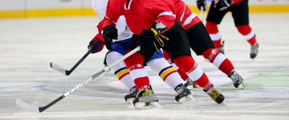 Ice hockey player on the ice. Team sport
