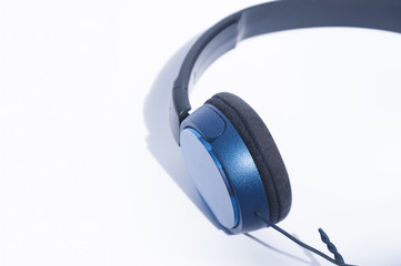 Blue headphones on white background