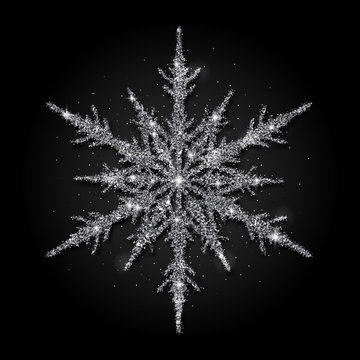 Silver glitter snowflake on black background vector