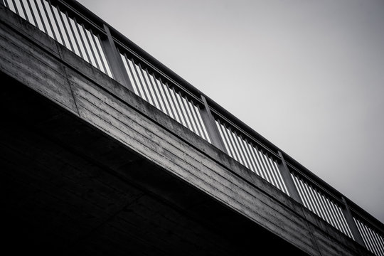 Fototapeta Bridge security railing in black and white