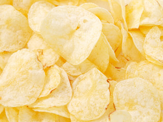 natural potato chips golden on a white background.