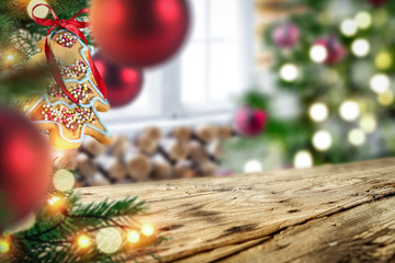 Wooden old table in the world with a Christmas tree and baubles  