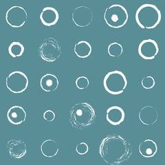 Seamless pattern. Black background and white circles drawn in chalk. Repeating abstract pattern.