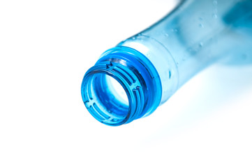 closeup of open plastic bottle neck on white background