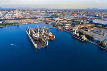 Obraz premium TOP VIEW, Aerial View of Industrial port with containers ship, business logistics concept, Aerial view from drone.