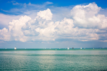 Lake Balaton with a nice cloudscape and sailboats in Hungary