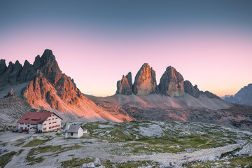 alpenglow during a summer sunset in Tre Cime di Lavaredo in Dolomites area