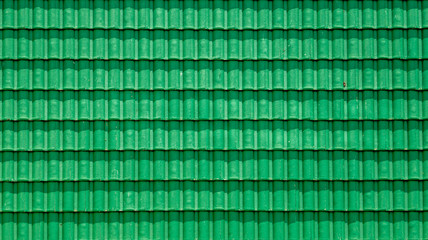 The stripe of the green roof by top view with the shadow at the roof edge. 