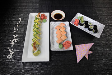 Japanese sushi set with ready to serve. Beautiful eastern style table decoration with sushi.