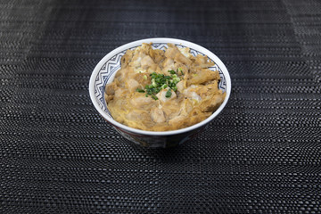 Close up view of plate with japanese food inside. Japan traditional food on wooden table.